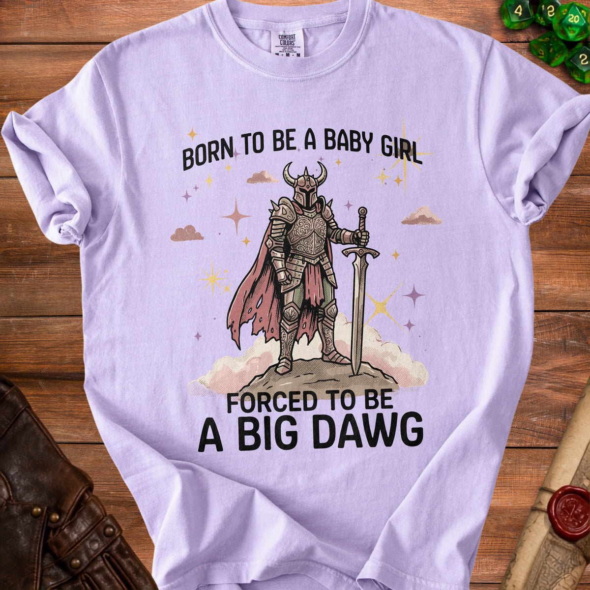 Purple t-shirt with knight graphic and text "Born to be a baby girl, forced to be a big dawg."