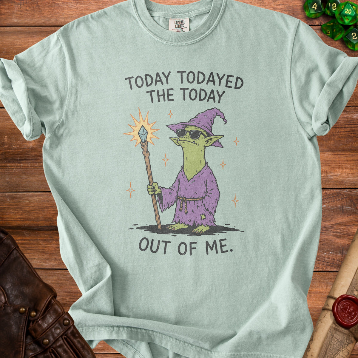 Light green t-shirt with illustration of a goblin wizard and text "TODAY TODAYED THE TODAY OUT OF ME."
