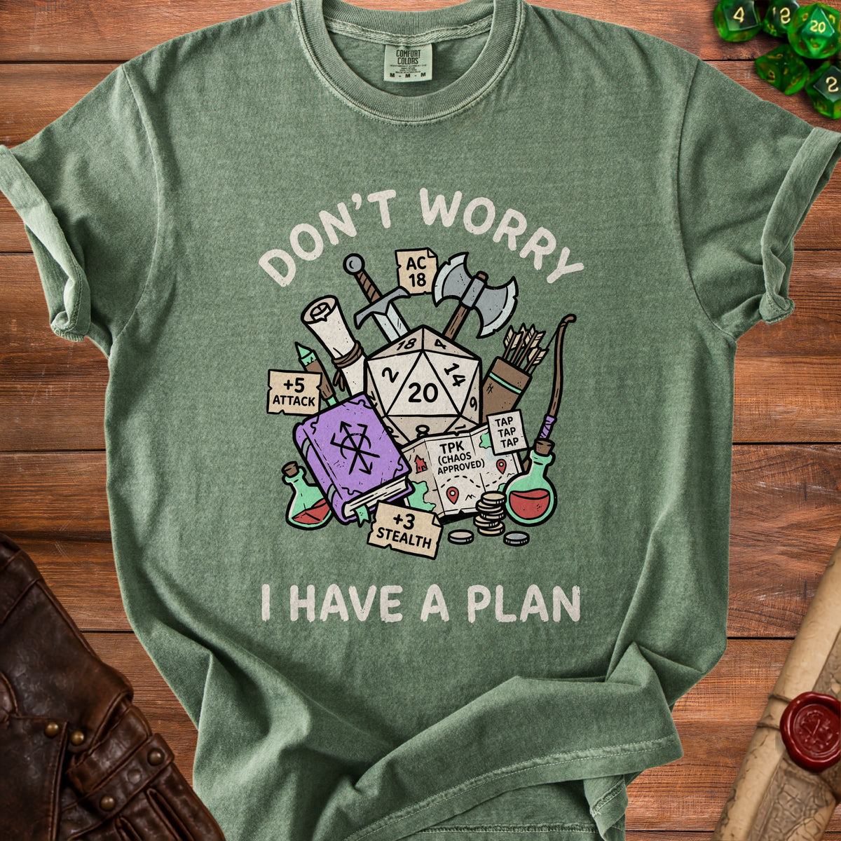Green t-shirt with Dungeons and Dragons themed graphic and text: "Don't worry I have a plan".