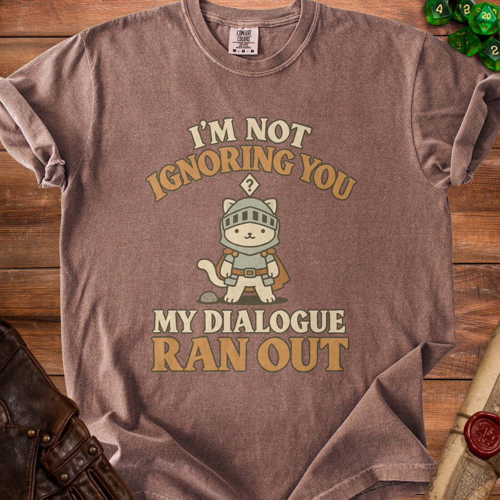 Brown t-shirt with a knight cat graphic and text "I'm not ignoring you, my dialogue ran out."