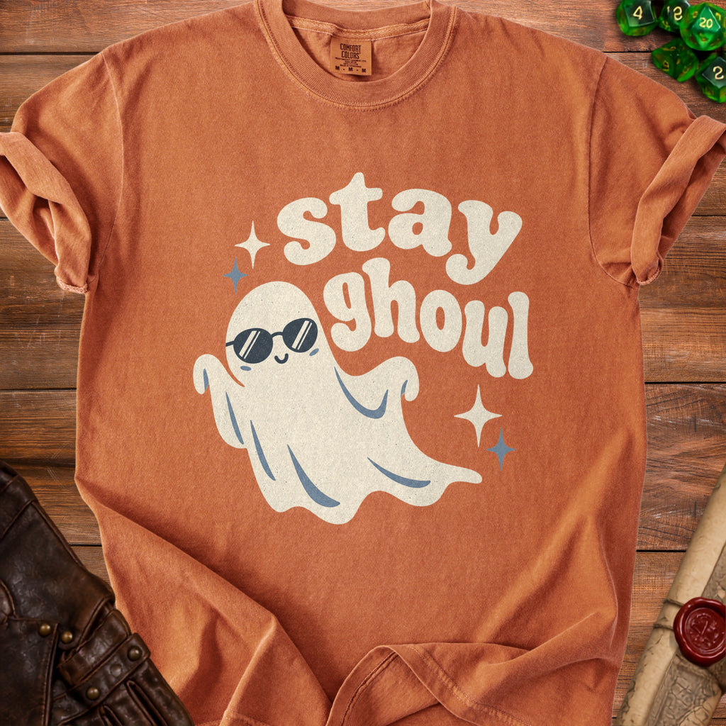 Orange t-shirt with a ghost wearing sunglasses and "stay ghoul" text.