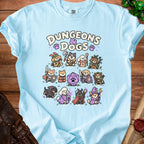 Light blue t-shirt with cartoon dogs in fantasy roles, reading "Dungeons & Dogs".