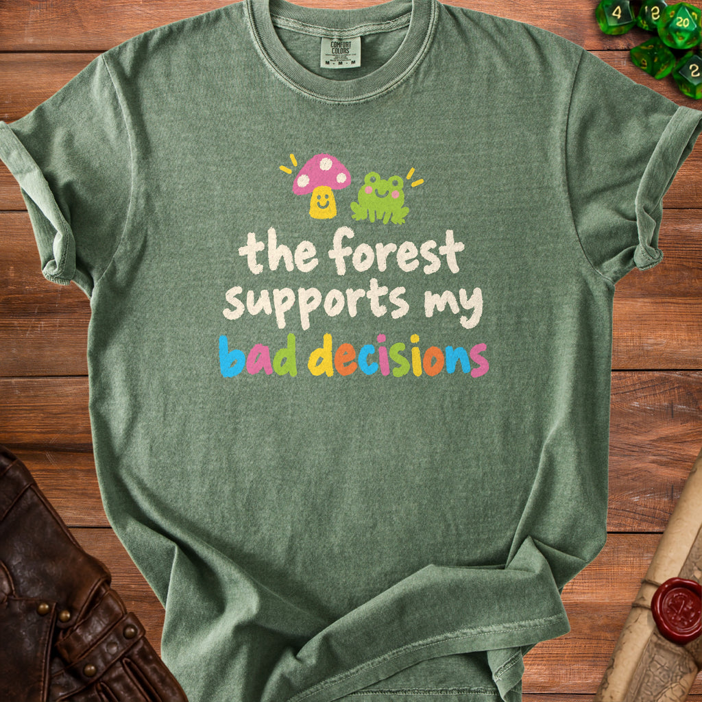 Green t-shirt with frog, mushroom, and text "the forest supports my bad decisions".