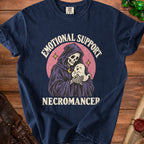 Dark blue t-shirt with Grim Reaper holding a ghost, text "Emotional Support Necromancer".
