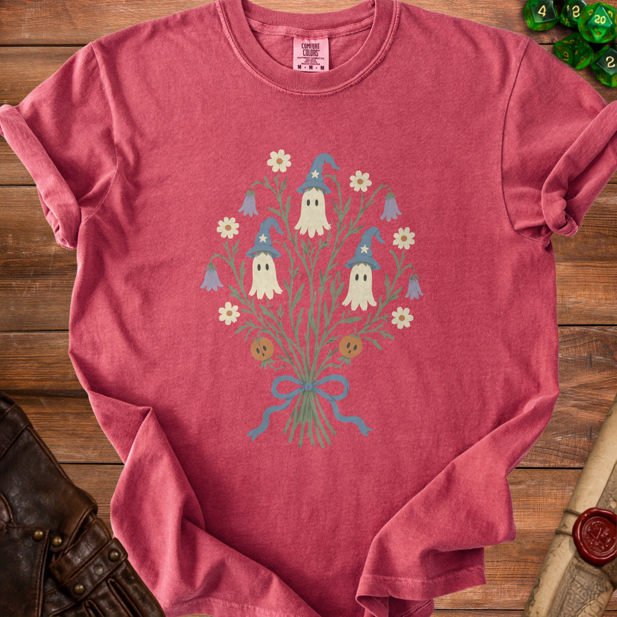 Red t-shirt with a bouquet of ghosts wearing wizard hats and pumpkins.