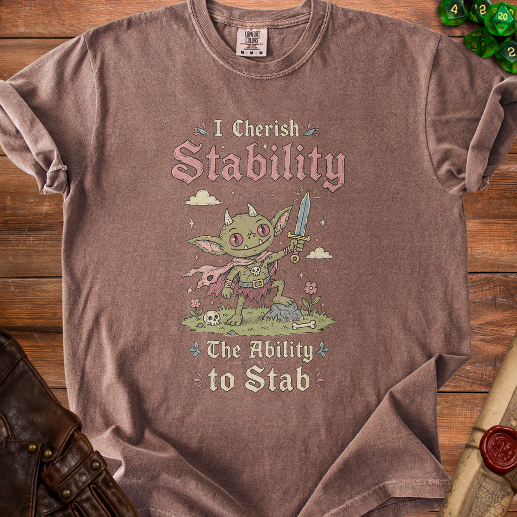 Brown t-shirt with a goblin holding a sword and the text "I Cherish Stability The Ability to Stab".