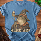 Blue t-shirt with illustration of a bored toad wizard holding a wand, text "SPELLCASTER-ISH".