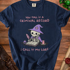 Dark blue t-shirt with a skeleton wizard writing lore, "You call it a criminal record, I call it my lore."