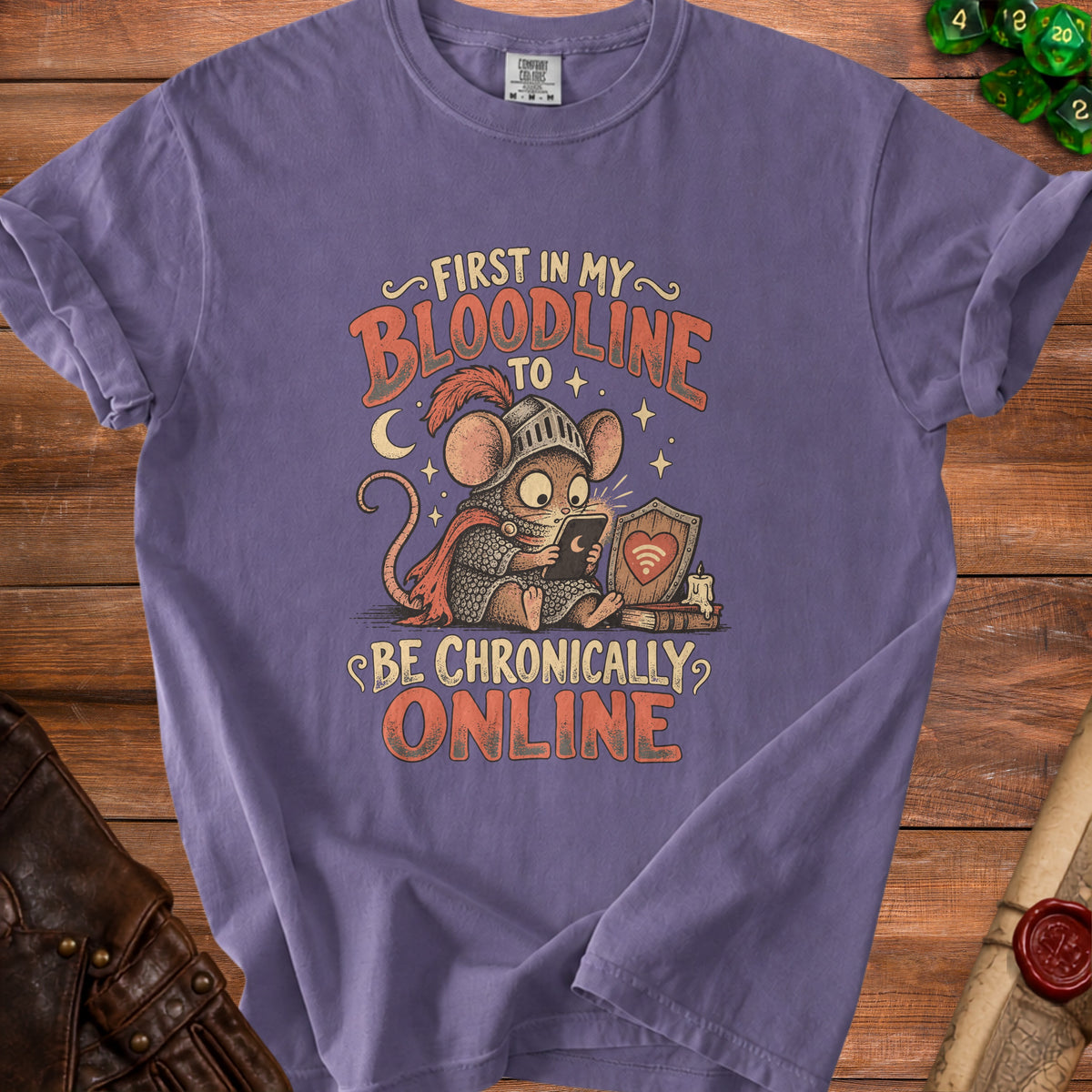 Purple t-shirt graphic: mouse knight reading on phone, text "First in my bloodline to be chronically online".
