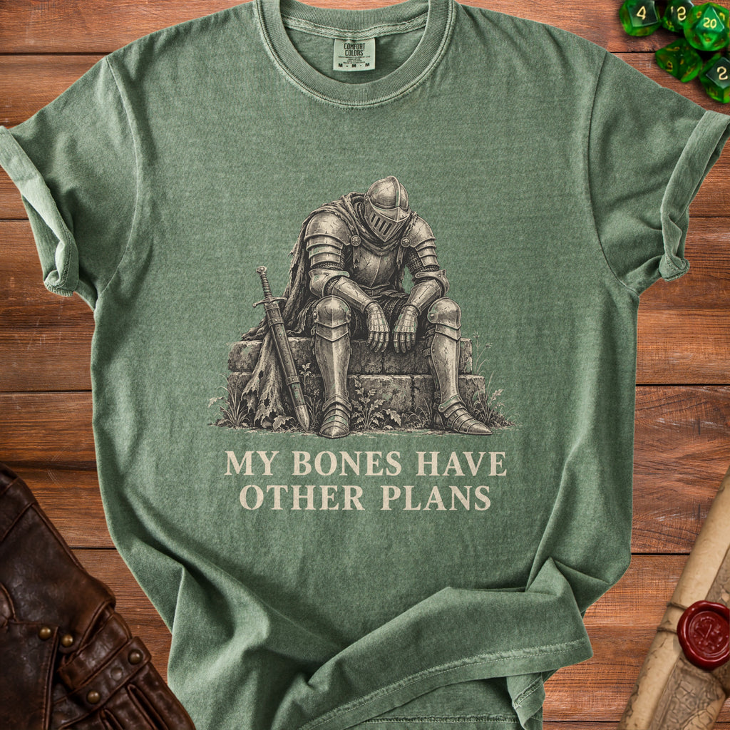 Green t-shirt with a knight sitting next to a sword, text reads "MY BONES HAVE OTHER PLANS".