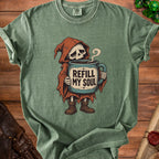 Grim reaper graphic on green t-shirt with "Refill My Soul" text on mug.