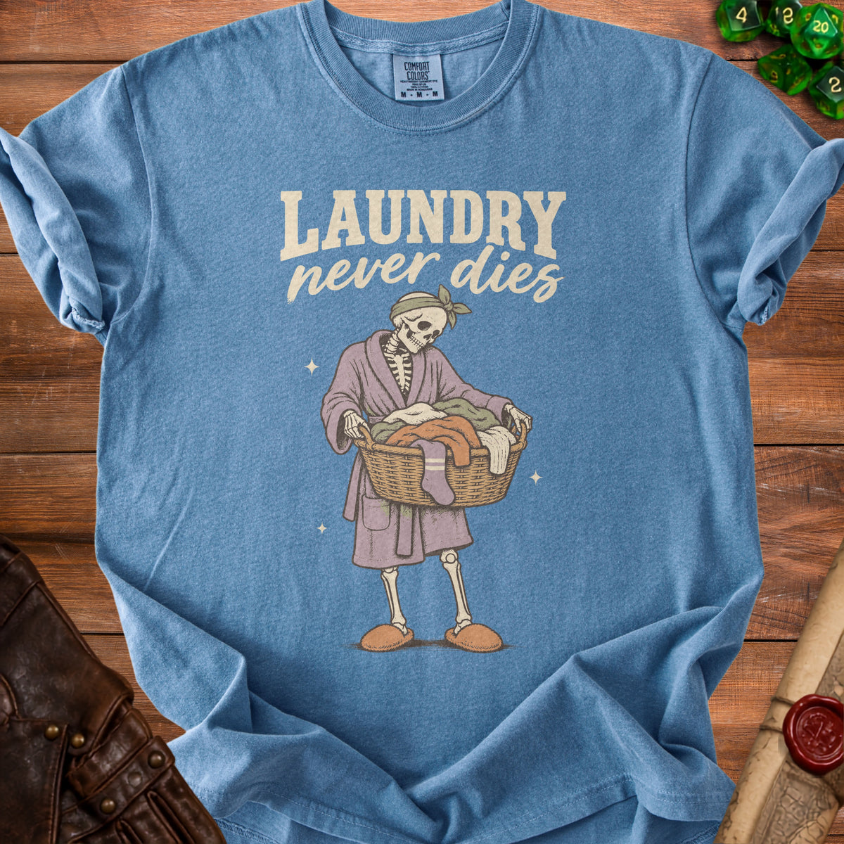 Skeleton in robe carrying laundry basket with text "LAUNDRY never dies"