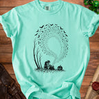 Teal t-shirt with black graphic of a goblin, pumpkin, and bats.