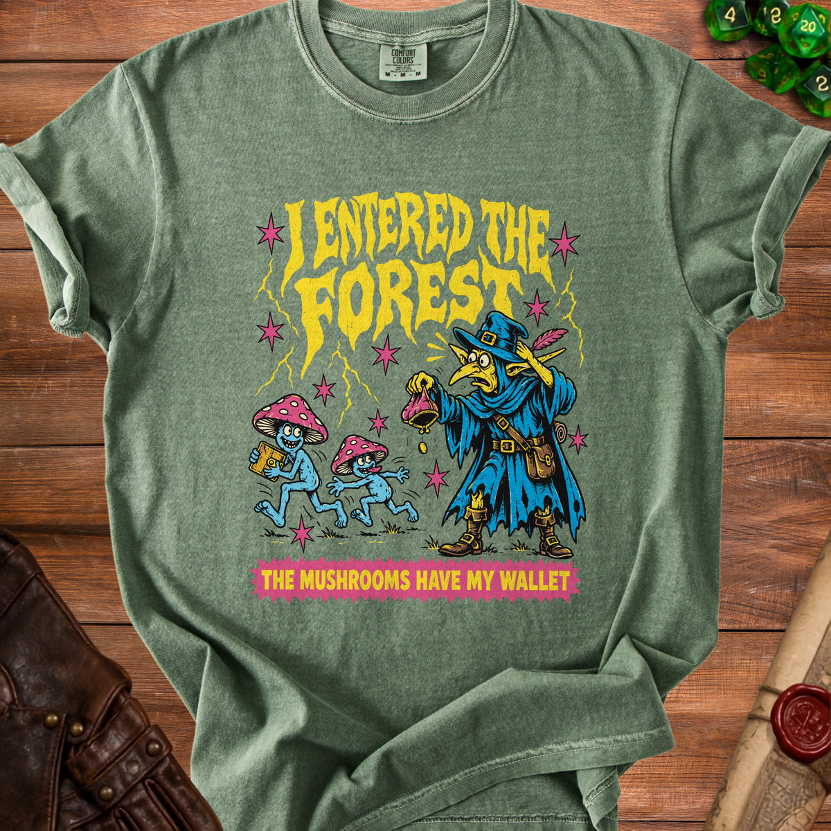 Green t-shirt with wizard and running mushrooms graphic and text "I ENTERED THE FOREST".