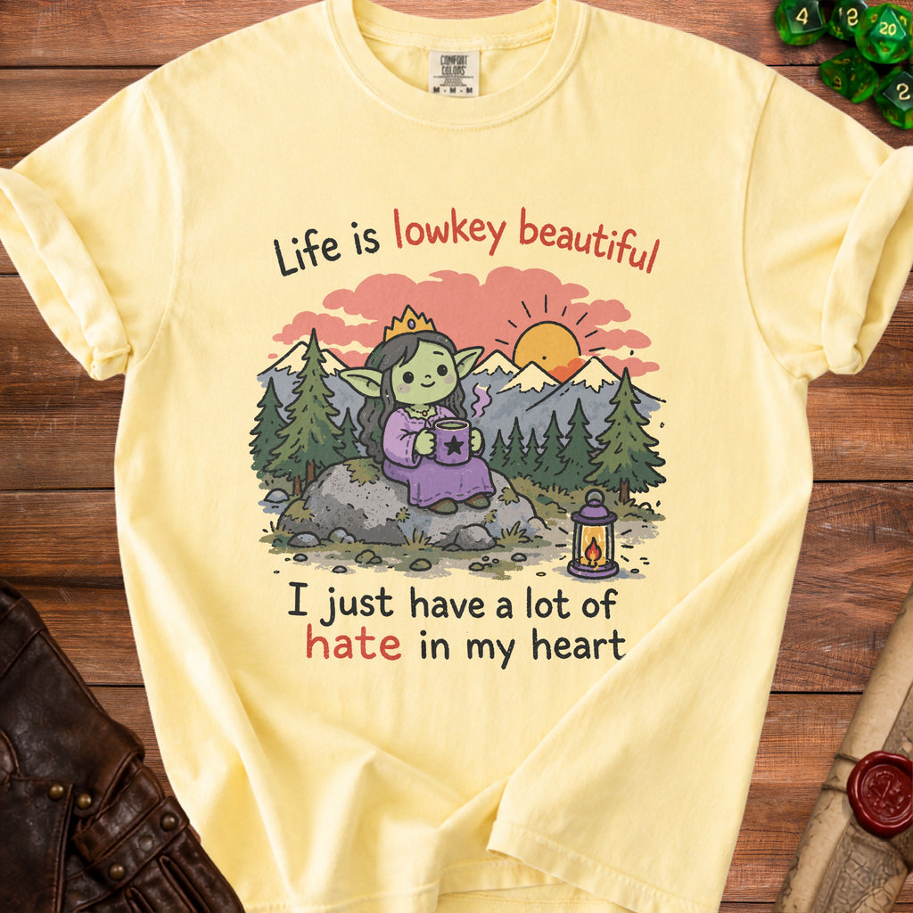 Yellow t-shirt with a cartoon character and text "Life is lowkey beautiful I just have a lot of hate in my heart".