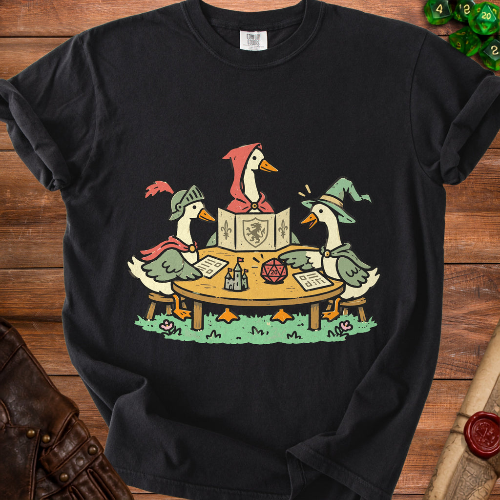 Three cartoon geese in fantasy attire play a tabletop role-playing game around a wooden table.