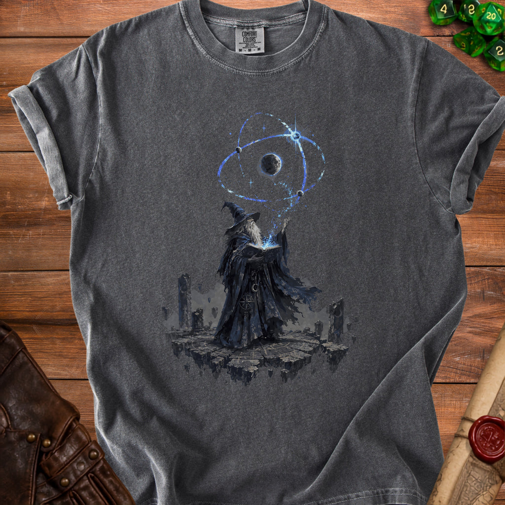 Dark t-shirt with wizard casting a spell over a celestial orb graphic.
