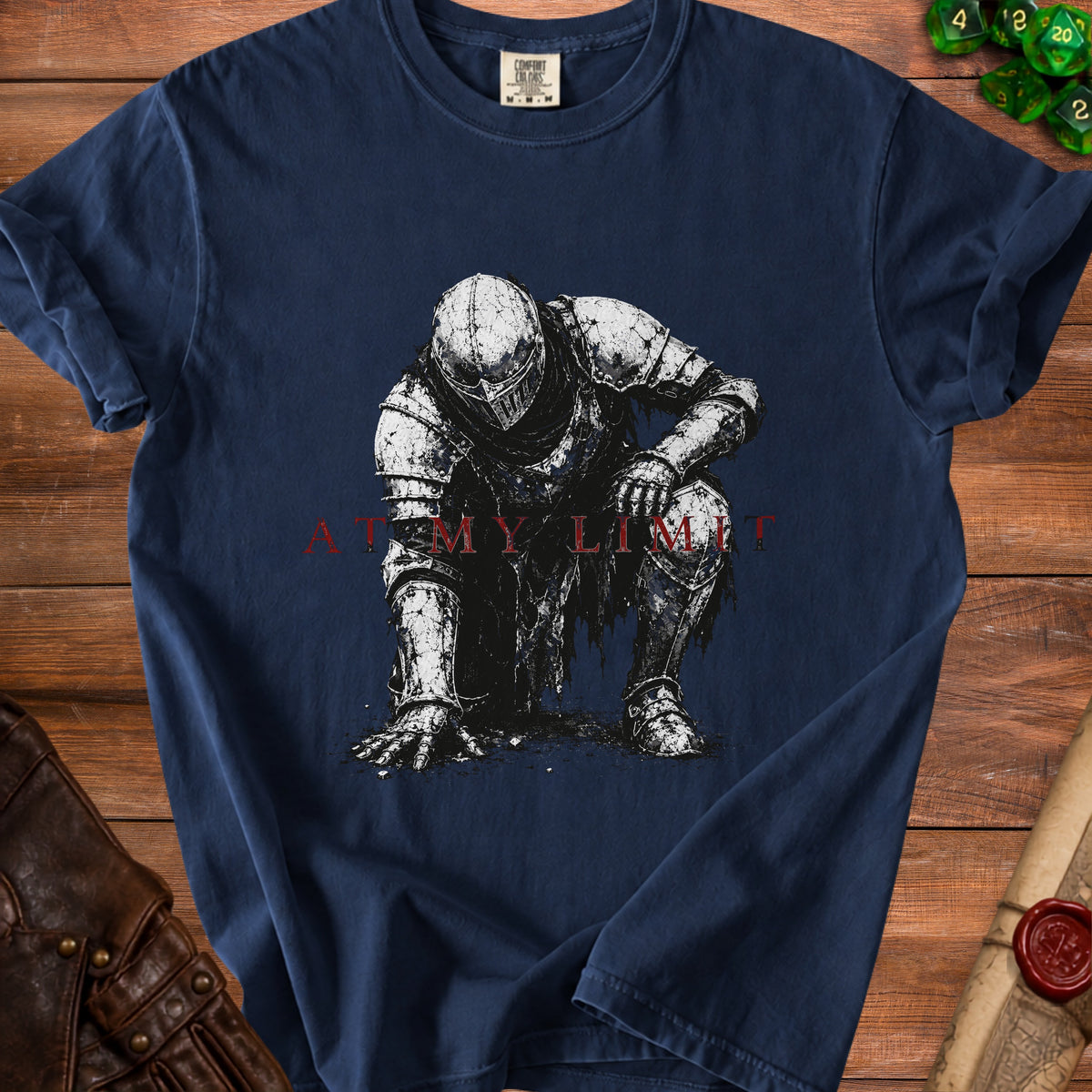 Dark t-shirt with a distressed knight graphic and red text "AT MY LIMIT".