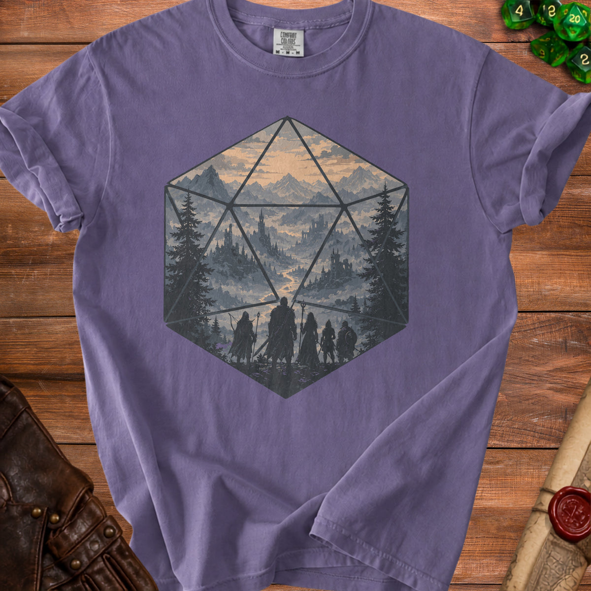 Purple t-shirt with a D20 dice graphic featuring a fantasy landscape and adventurers.
