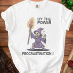 White t-shirt with graphic of a skeleton wizard saying "BY THE POWER PROCRASTINATION!!".