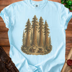 T-shirt with wizard, goblin, and open treasure chest in a forest.