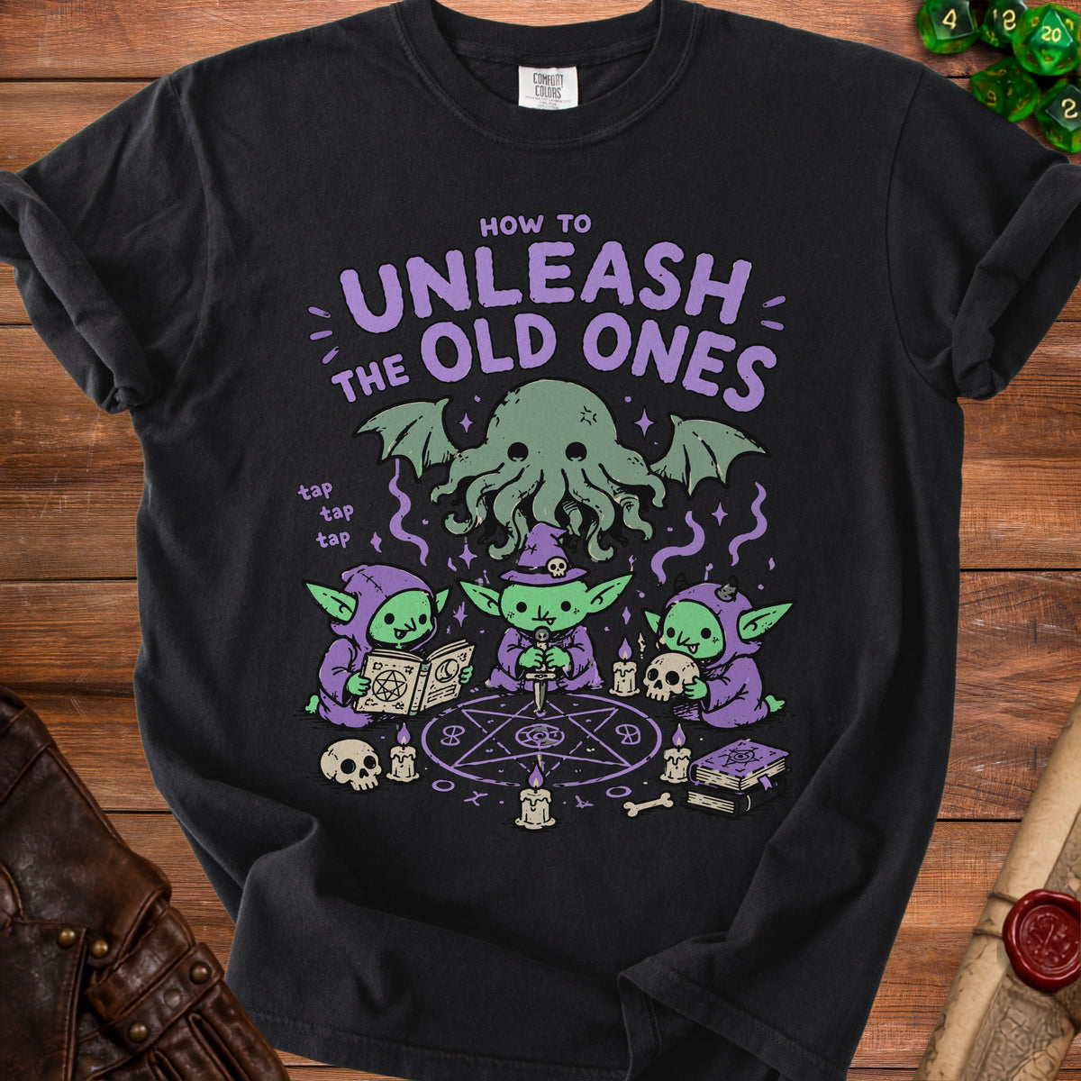 Black t-shirt with purple text "HOW TO UNLEASH THE OLD ONES" and Cthulhu graphic.