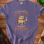 Purple t-shirt with a frog hero, sword, and mug. Text reads "Victory at last, A grand, HUZZAH."