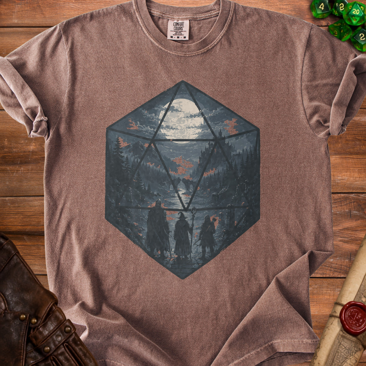 Brown t-shirt featuring a D20 die graphic with a fantasy landscape and three adventurers.