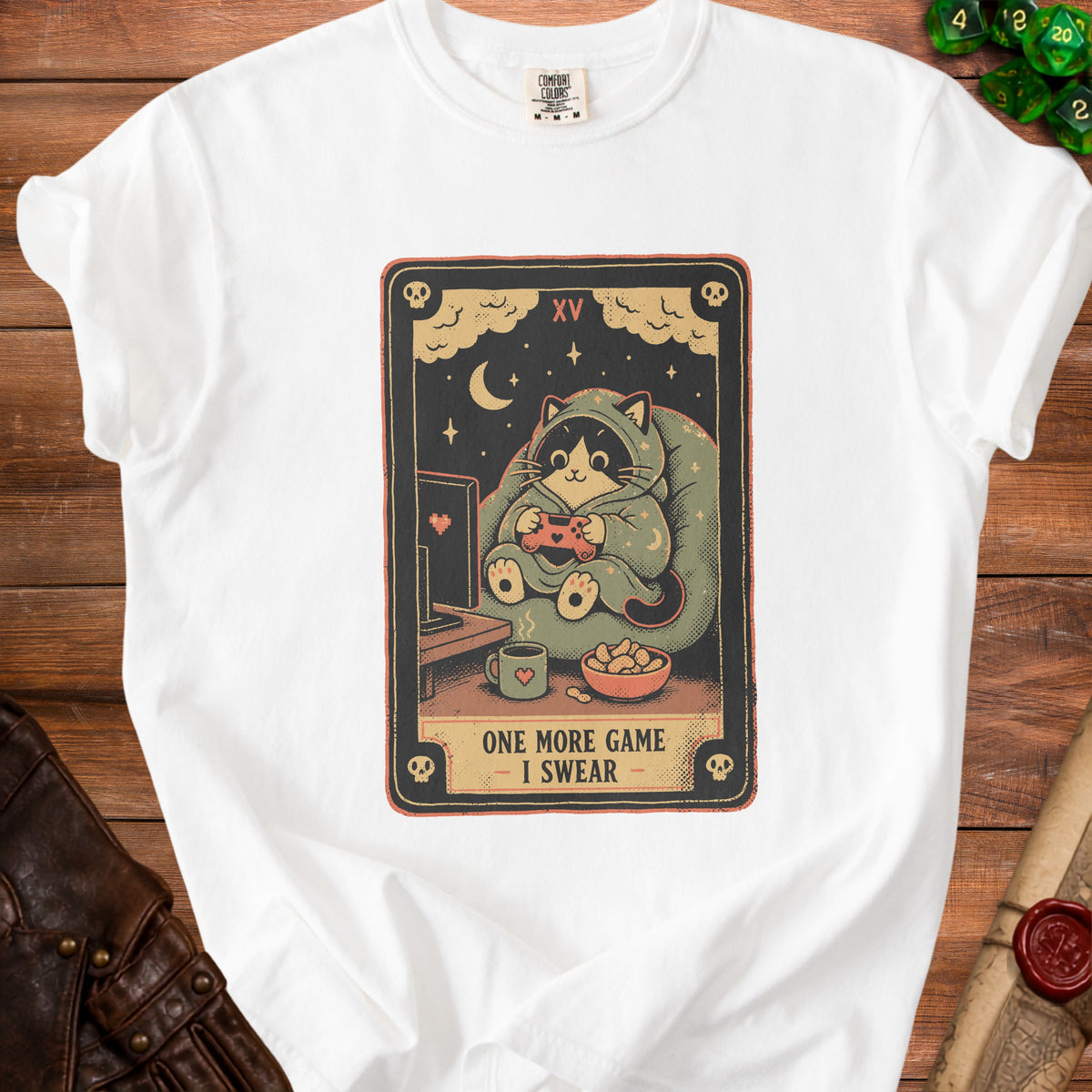 White t-shirt with tarot card graphic of a cat playing video games.