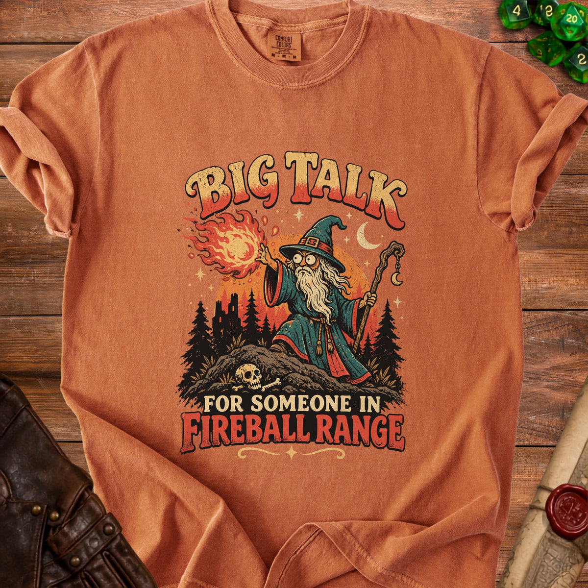 Orange t-shirt with wizard graphic and text "Big Talk For Someone In Fireball Range".
