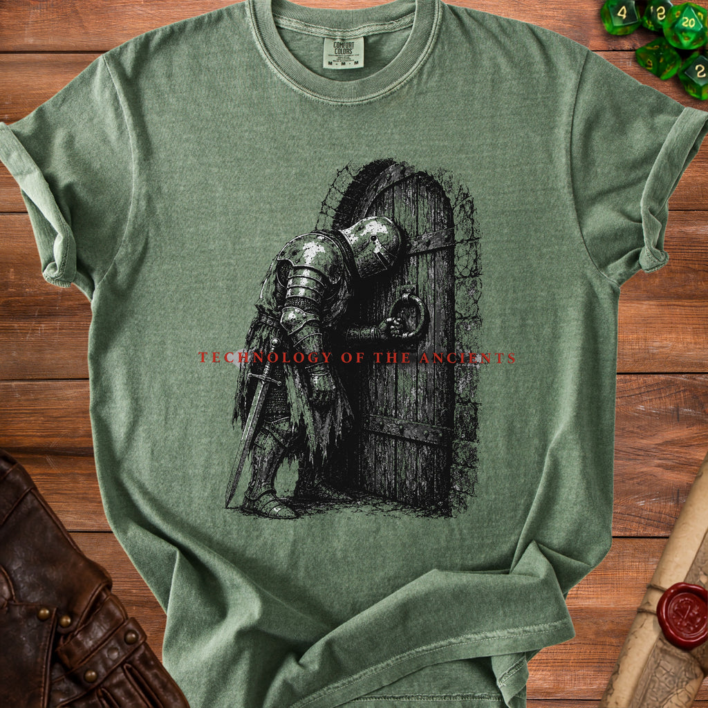 Green t-shirt with knight at a door design and "TECHNOLOGY OF THE ANCIENTS" text.