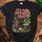 Black t-shirt with "It's a Potion Night" and brewing scene.