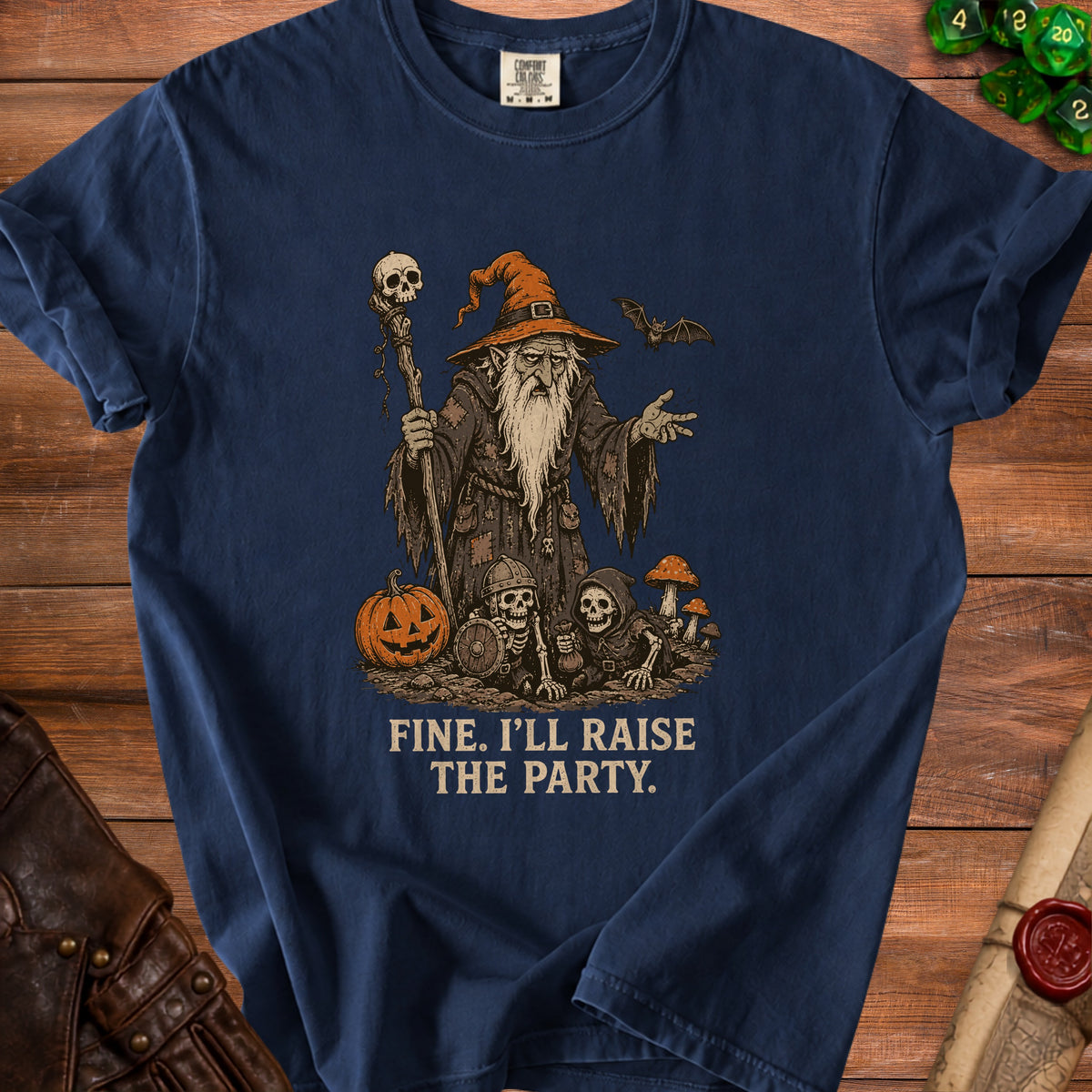 Navy t-shirt with wizard, skeletons, pumpkin, and text "FINE. I'LL RAISE THE PARTY."