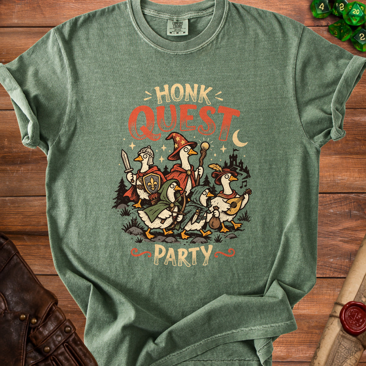 Green t-shirt with "HONK QUEST PARTY" text and cartoon geese dressed as adventurers.