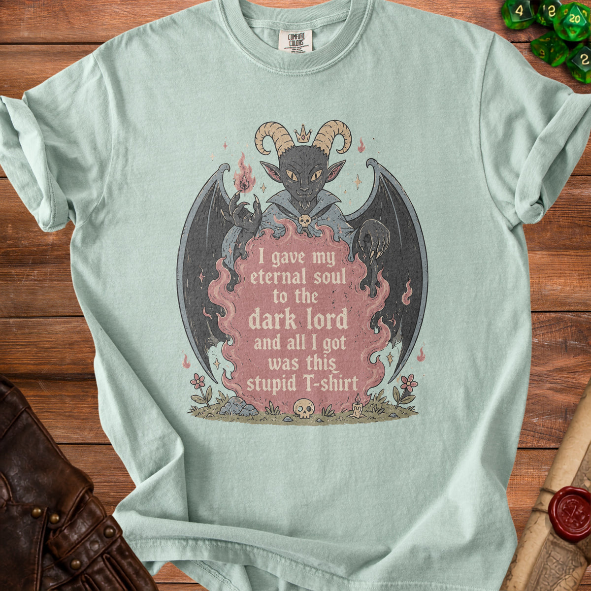 Light blue t-shirt with a demon graphic and text "I gave my eternal soul to the dark lord and all I got was this stupid T-shirt".