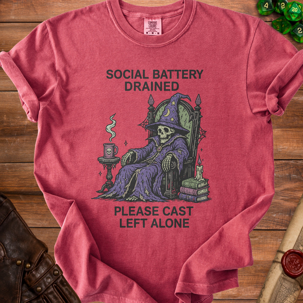 Skeleton wizard on throne with text "Social Battery Drained Please Cast Left Alone".