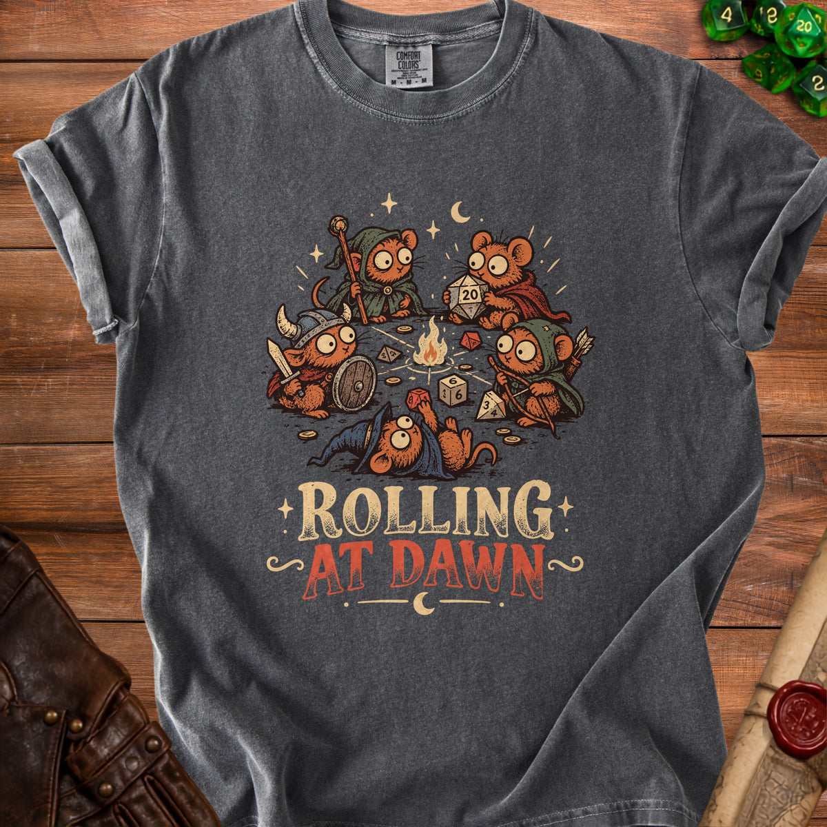 T-shirt graphic of mice playing Dungeons & Dragons, with text "Rolling at Dawn".