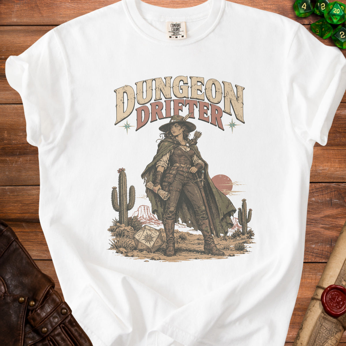White t-shirt with "Dungeon Drifter" text and desert adventurer illustration.