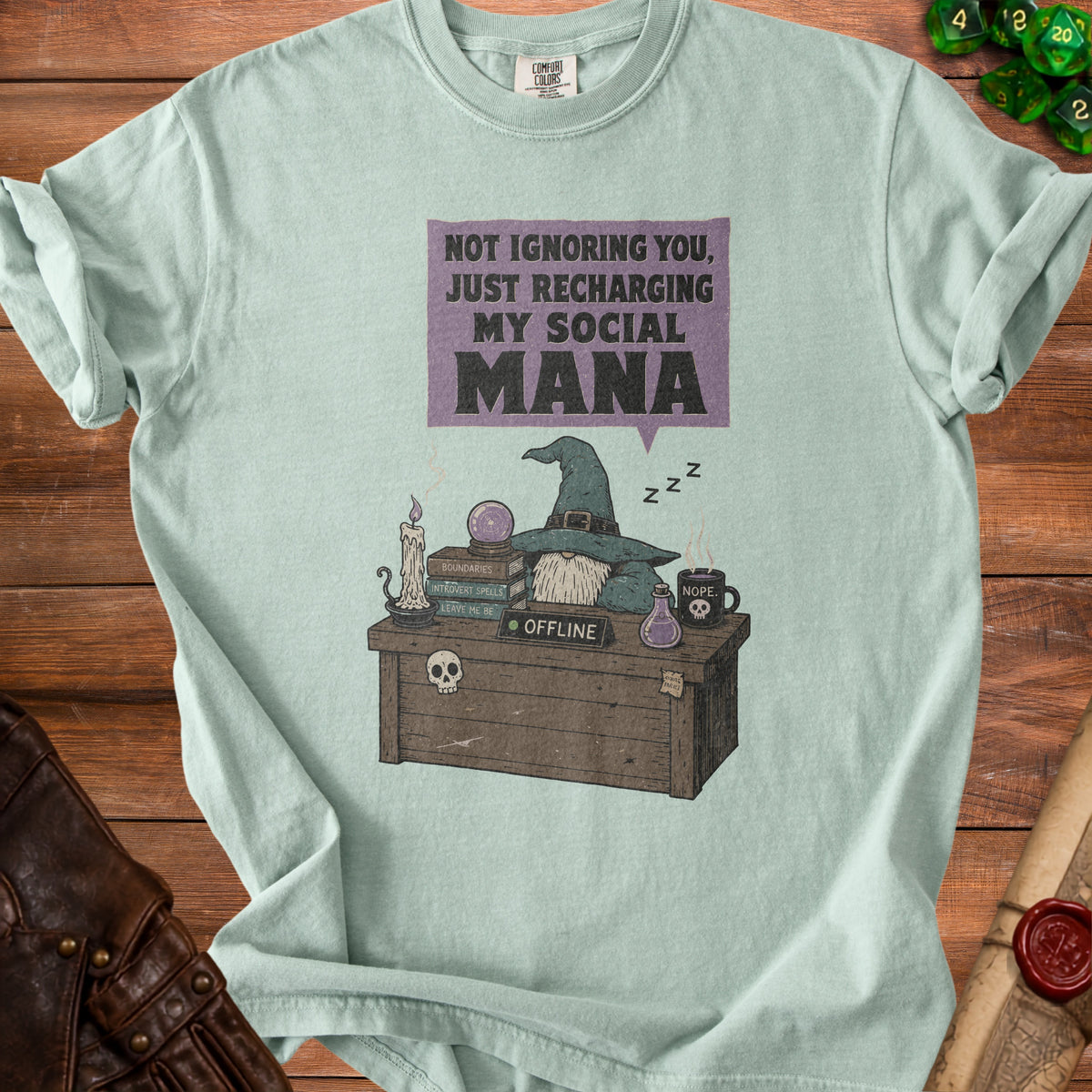 Mint t-shirt with text "Not Ignoring You, Just Recharging My Social Mana" and wizard gnome graphic.