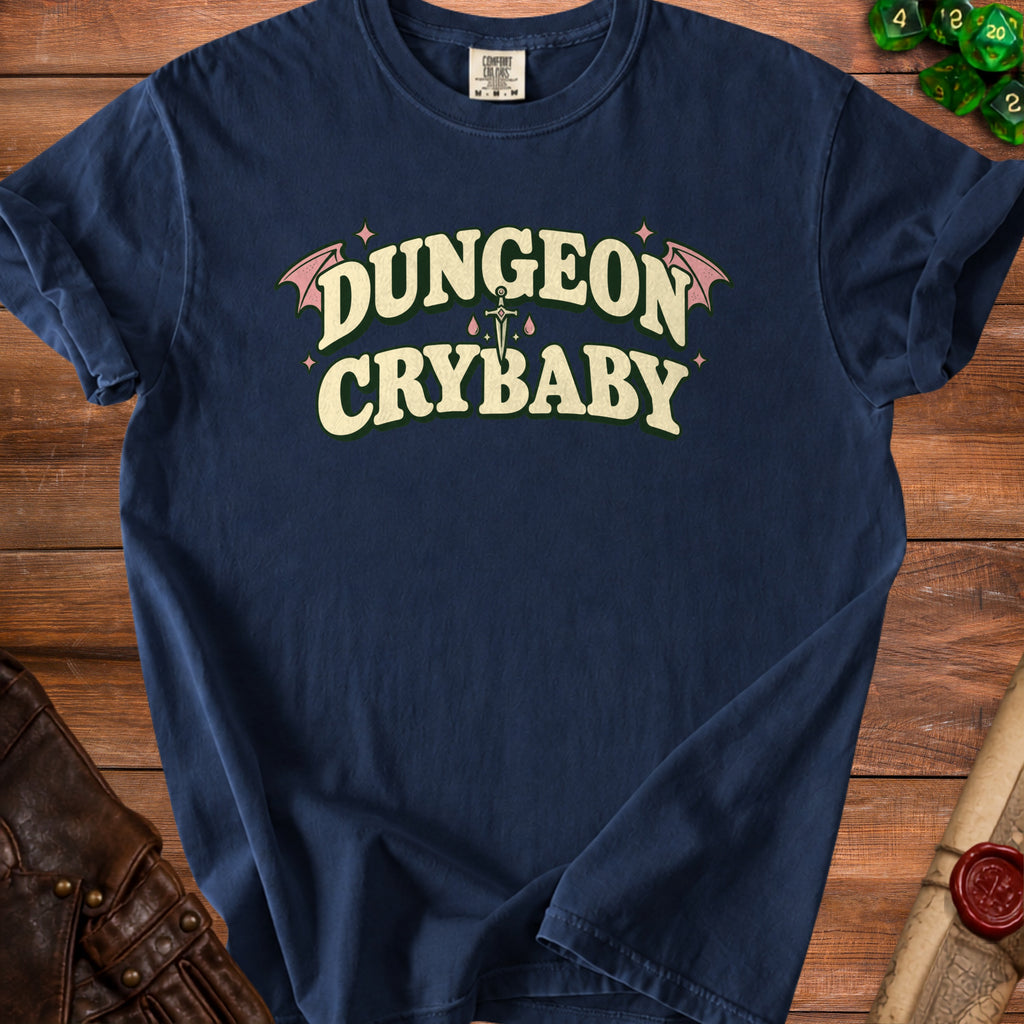 Navy t-shirt with "Dungeon Crybaby" text and d20 dice.