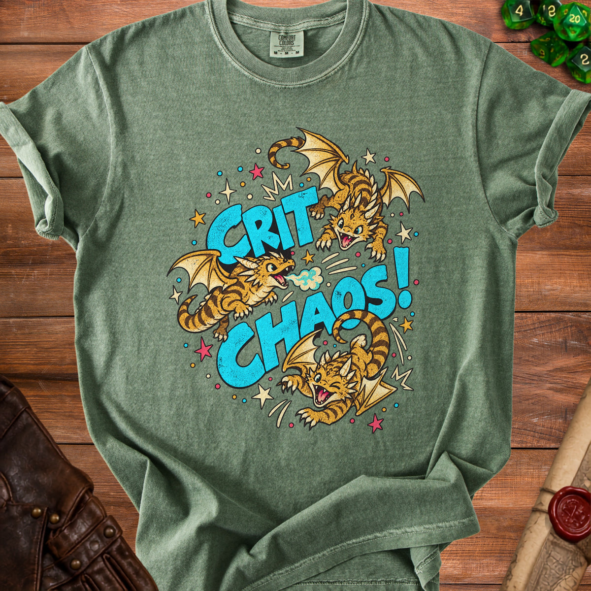 Green t-shirt with "CRIT CHAOS!" text and three cartoon dragons.