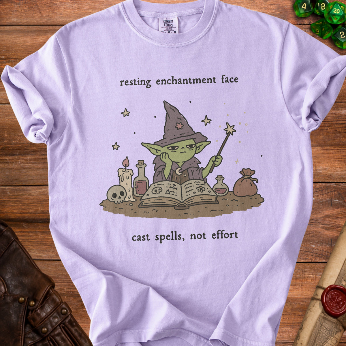T-shirt with cartoon witch and text "resting enchantment face" and "cast spells, not effort".