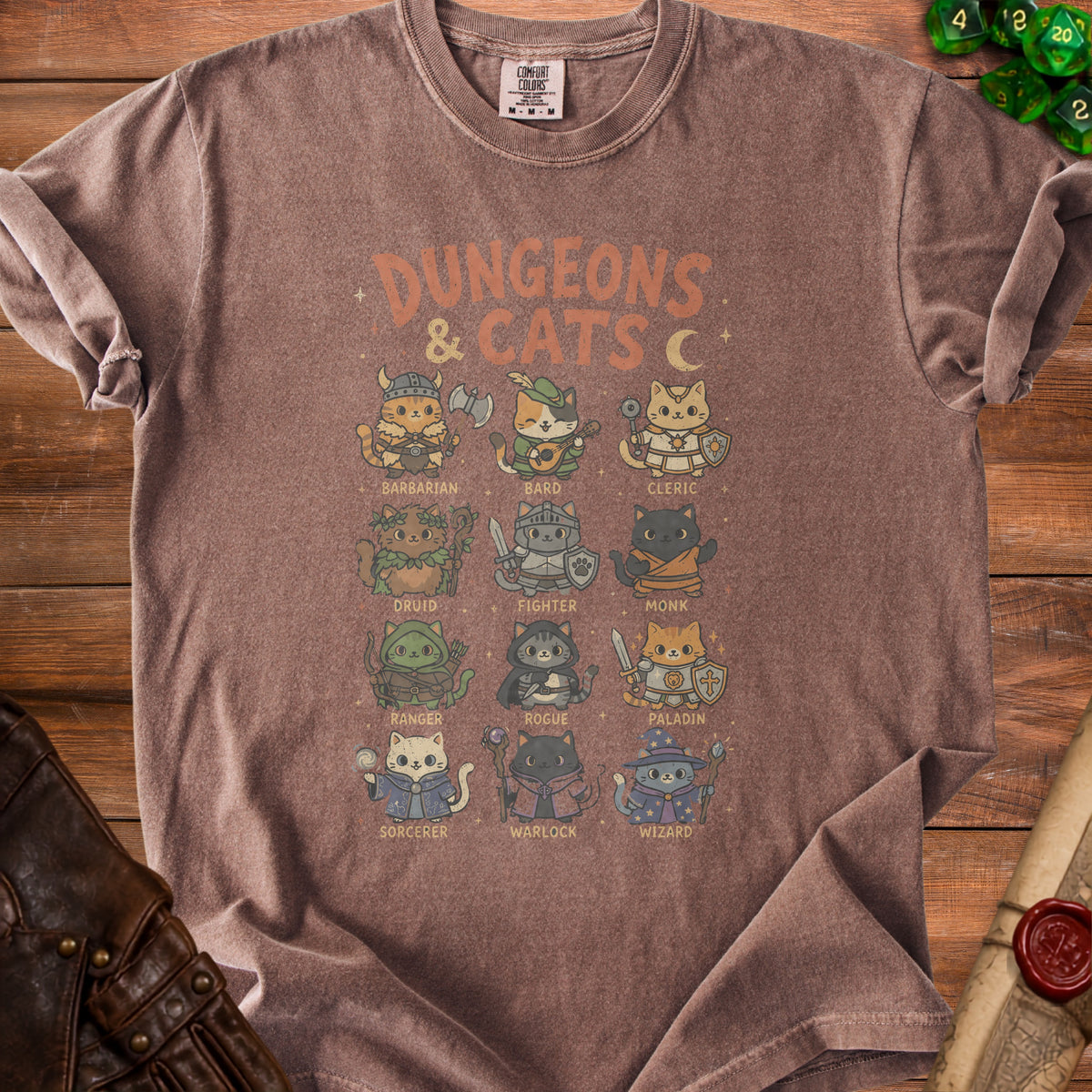 Brown t-shirt with "Dungeons & Cats" graphic showing cats as fantasy characters.