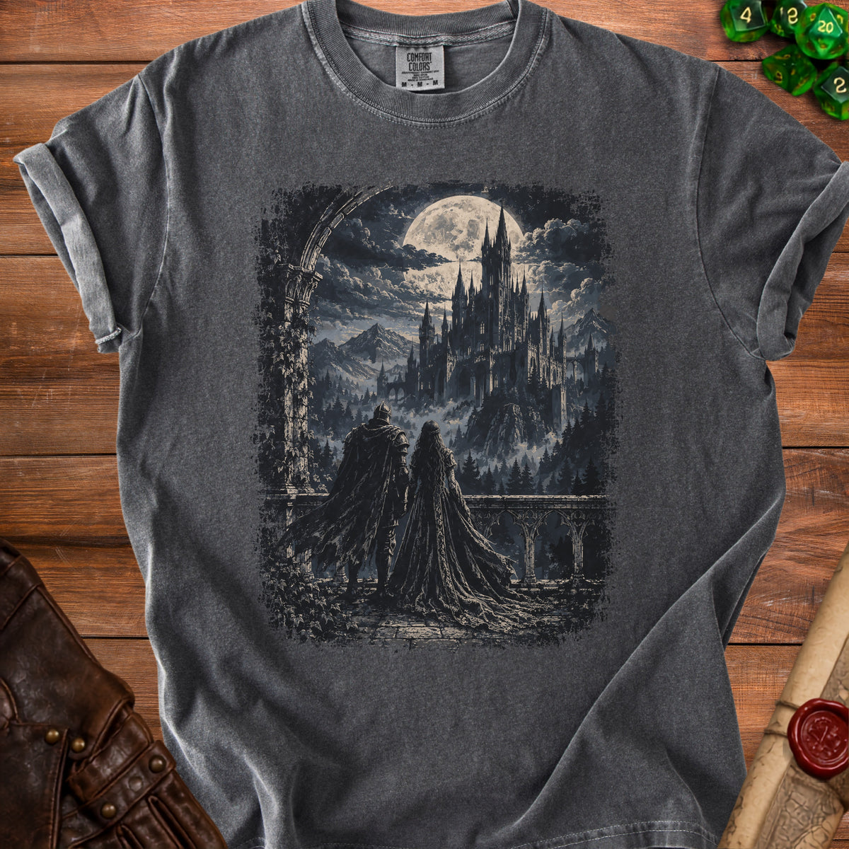 Dark t-shirt with a fantasy castle and moon graphic featuring two figures on a balcony.