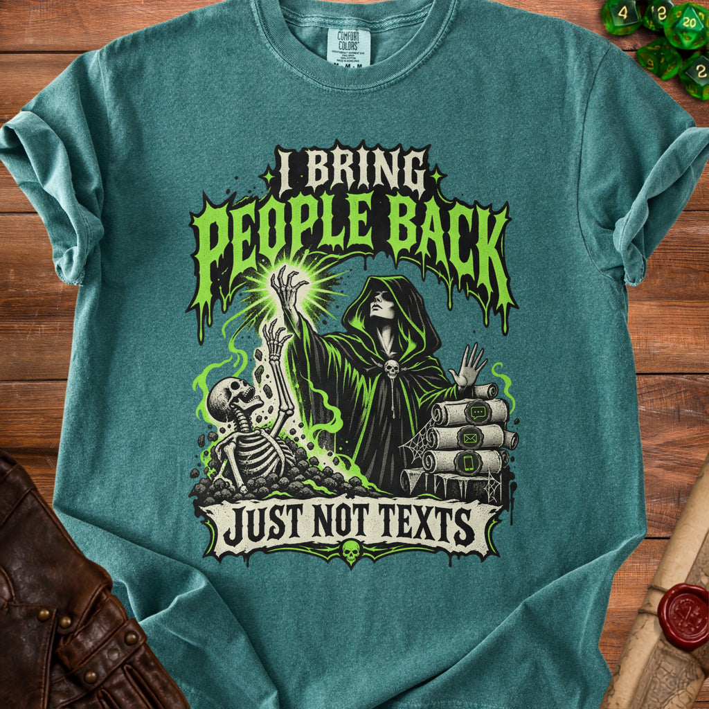 Green t-shirt with graphic of cloaked figure, skeleton, and text "I BRING PEOPLE BACK JUST NOT TEXTS".