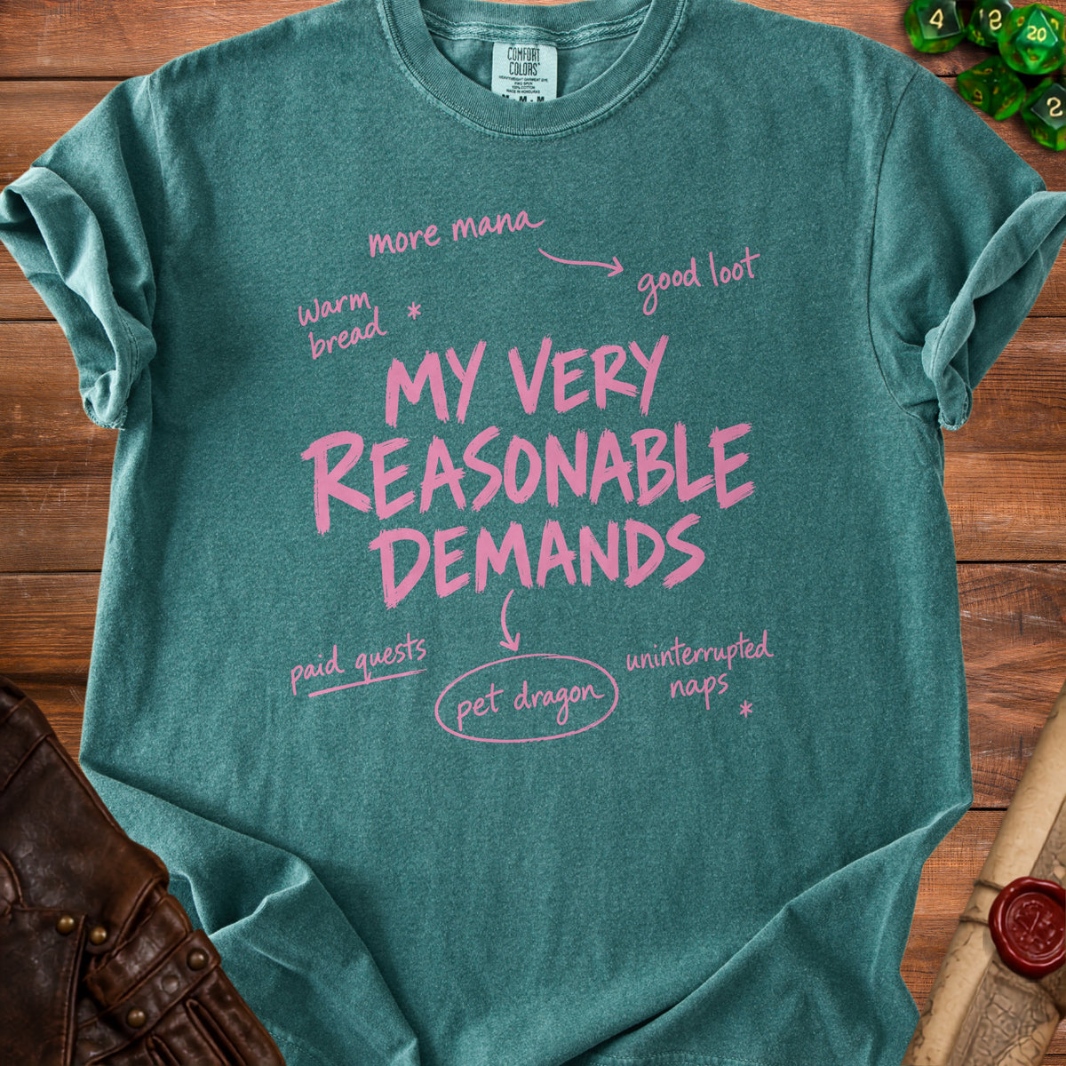 Teal t-shirt with pink text: "MY VERY REASONABLE DEMANDS" with related demands.