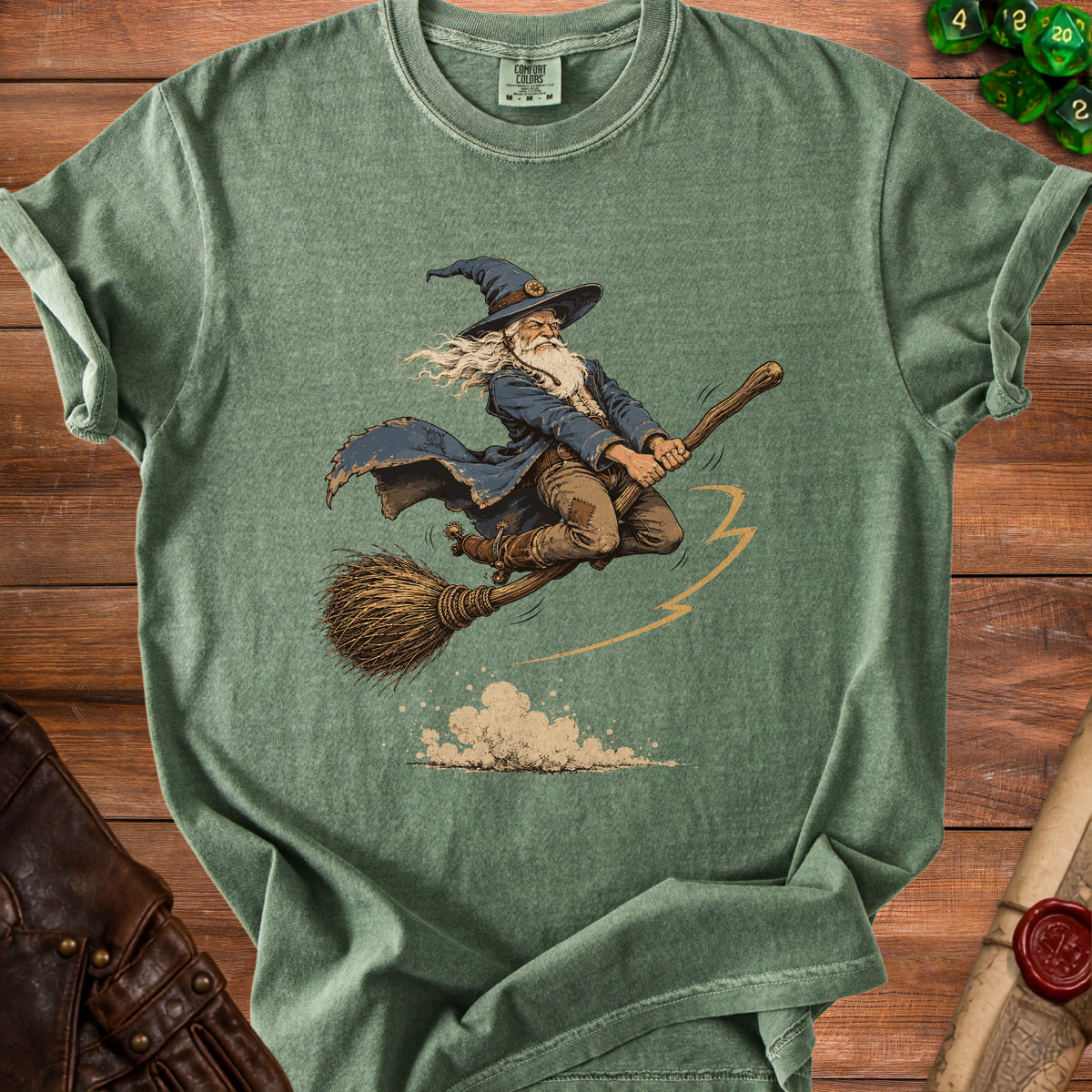 Wizard flying on a broomstick with dusty clouds and lightning bolt graphic on shirt.