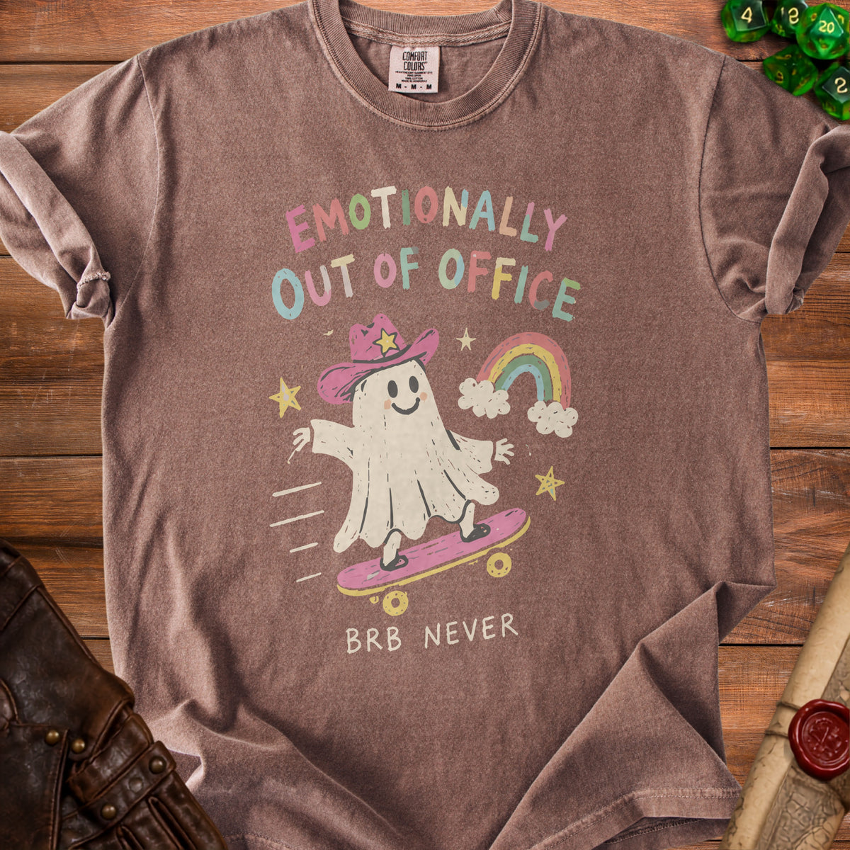 Brown t-shirt with ghost skateboarding graphic: "Emotionally Out of Office BRB Never".