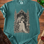 Teal t-shirt with gothic illustration of a woman reading a scroll, with text "SHOULD HAVE READ THE PACT".