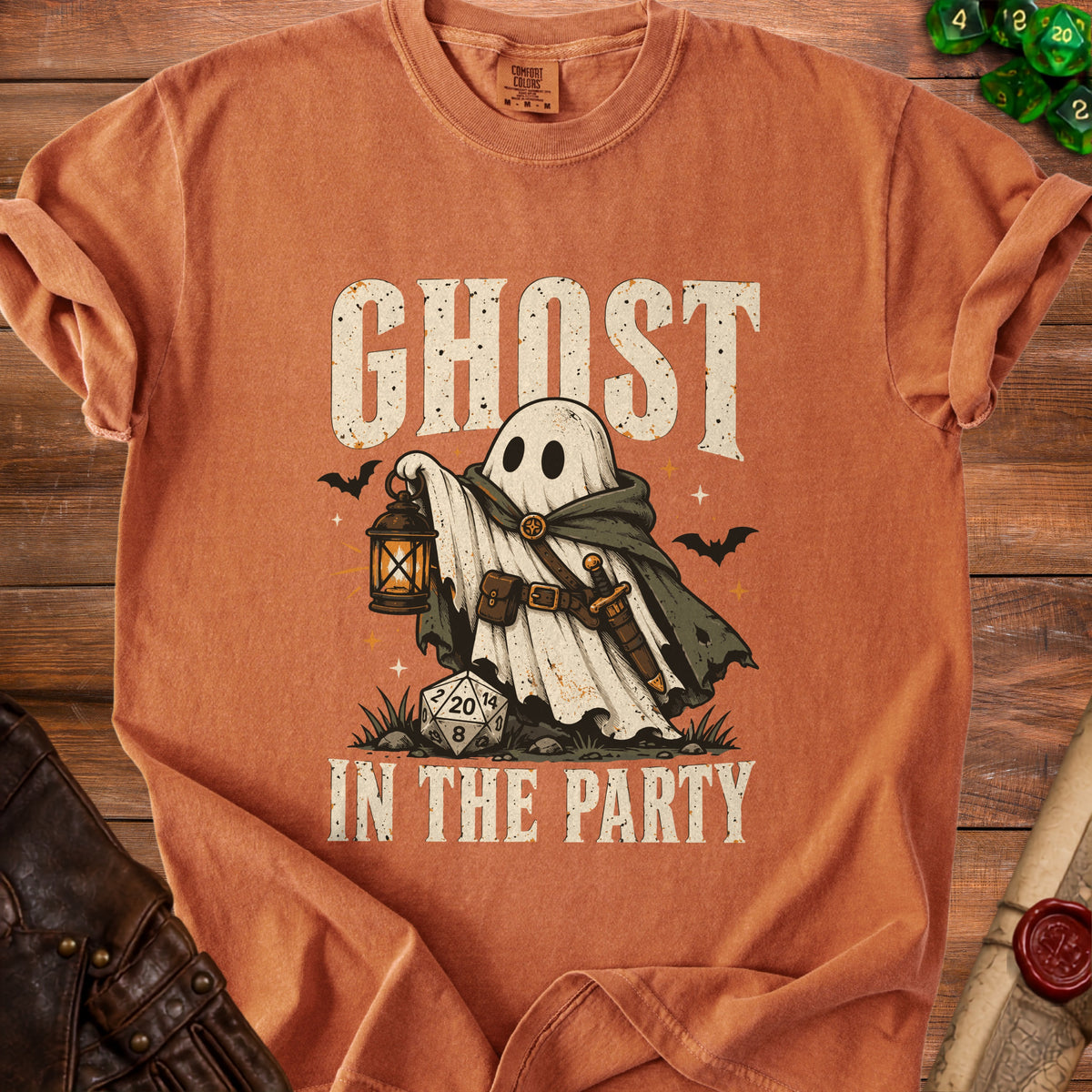 Ghost character in cloak holding lantern, with D20 die and text "GHOST IN THE PARTY".